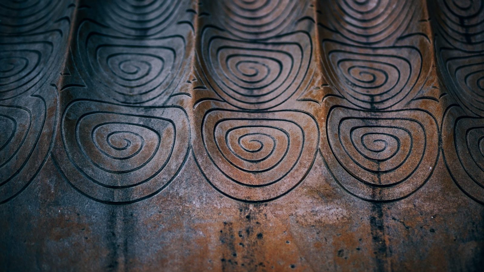 Close-up Shot of Reincarnation Swirls Carved on Walls